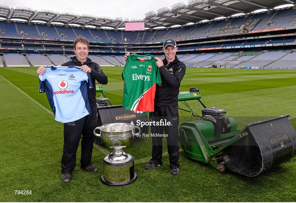 20 September 2013; Croke Park pitch manager Stuart Wilson, left, and groundsman Padhraic Greene with Dublin and Mayo jerseys and the Sam Maguire cup after cutting the pitch ahead of the GAA Football All-Ireland Senior Championship Final between Dublin and Mayo on Sunday. Croke Park, Dublin. Picture credit: Ray McManus / SPORTSFILE