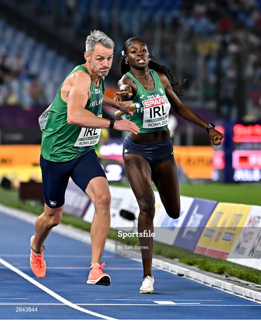 7 June 2024; Rhasidat Adeleke, right, passes the baton to Ireland teammate Thomas Barr in the Mixed 4x400m Relay final during day one of the 2024 European Athletics Championships at the Stadio Olimpico in Rome, Italy. Photo by Sam Barnes/Sportsfile