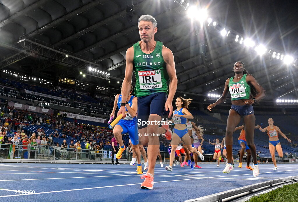 7 June 2024; Rhasidat Adeleke, right, passes the baton to Ireland teammate Thomas Barr in the Mixed 4x400m Relay finalduring day one of the 2024 European Athletics Championships at the Stadio Olimpico in Rome, Italy. Photo by Sam Barnes/Sportsfile
