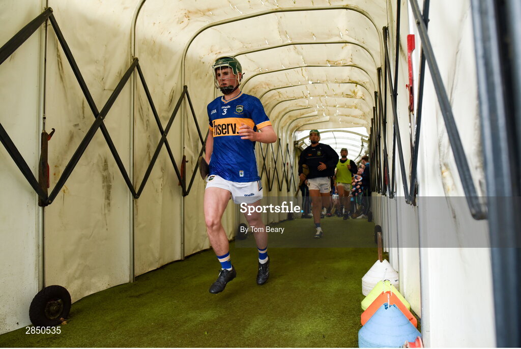 15 June 2024; Tipperary captain Cathal O'Reilly leads his side out before the Electric Ireland GAA Hurling All-Ireland Minor Hurling Championship semi-final match between Tipperary and Galway at TUS Gaelic Grounds in Limerick. Photo by Tom Beary/Sportsfile
