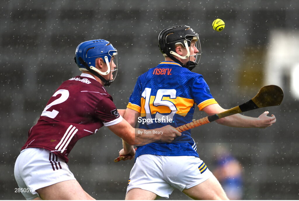15 June 2024; Cillian Minogue of Tipperary in action against Cathal Maloney of Galway during the Electric Ireland GAA Hurling All-Ireland Minor Hurling Championship semi-final match between Tipperary and Galway at TUS Gaelic Grounds in Limerick. Photo by Tom Beary/Sportsfile
