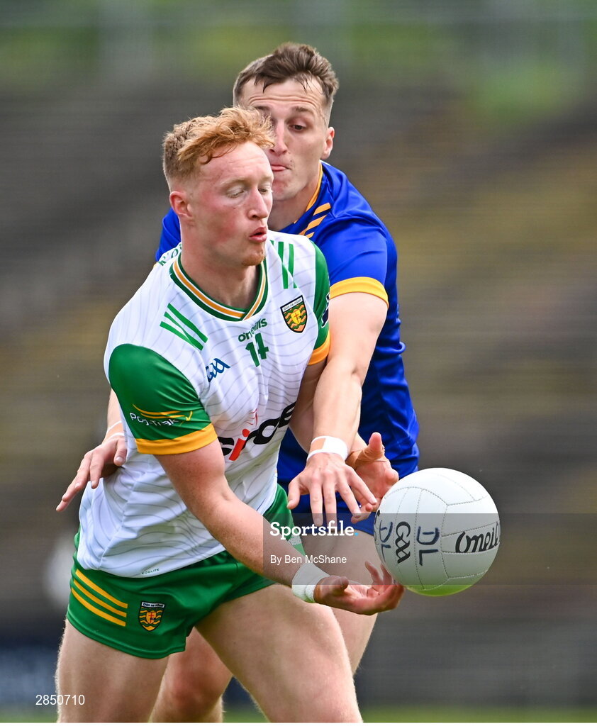 15 June 2024; Oisin Gallen of Donegal is tackled by Aaron Griffin of Clare during the GAA Football All-Ireland Senior Championship Round 3 match between Clare and Donegal at Hastings Insurance MacHale Park in Castlebar, Mayo. Photo by Ben McShane/Sportsfile