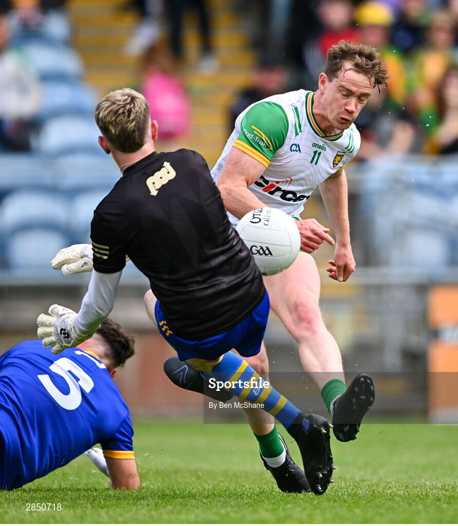 15 June 2024; Ciaran Thompson of Donegal has a shot on goal saved by Clare goalkeeper Tristan O'Callaghan during the GAA Football All-Ireland Senior Championship Round 3 match between Clare and Donegal at Hastings Insurance MacHale Park in Castlebar, Mayo. Photo by Ben McShane/Sportsfile