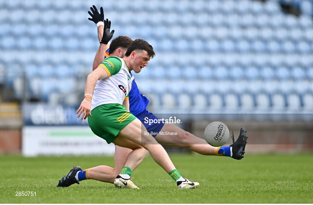 15 June 2024; Niall O'Donnell of Donegal is tackled by Ronan Lanigan of Clare during the GAA Football All-Ireland Senior Championship Round 3 match between Clare and Donegal at Hastings Insurance MacHale Park in Castlebar, Mayo. Photo by Ben McShane/Sportsfile