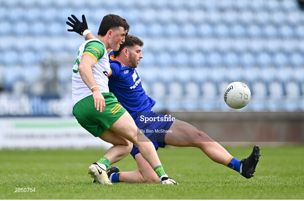 15 June 2024; Niall O'Donnell of Donegal is tackled by Ronan Lanigan of Clare during the GAA Football All-Ireland Senior Championship Round 3 match between Clare and Donegal at Hastings Insurance MacHale Park in Castlebar, Mayo. Photo by Ben McShane/Sportsfile