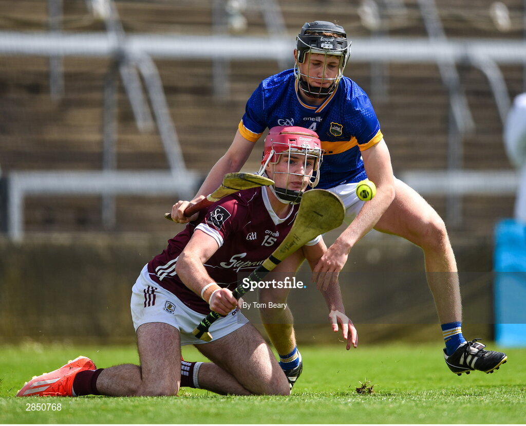 15 June 2024; Harry Holmes of Galway in action against Patrick Ryan of Tipperary during the Electric Ireland GAA Hurling All-Ireland Minor Hurling Championship semi-final match between Tipperary and Galway at TUS Gaelic Grounds in Limerick. Photo by Tom Beary/Sportsfile