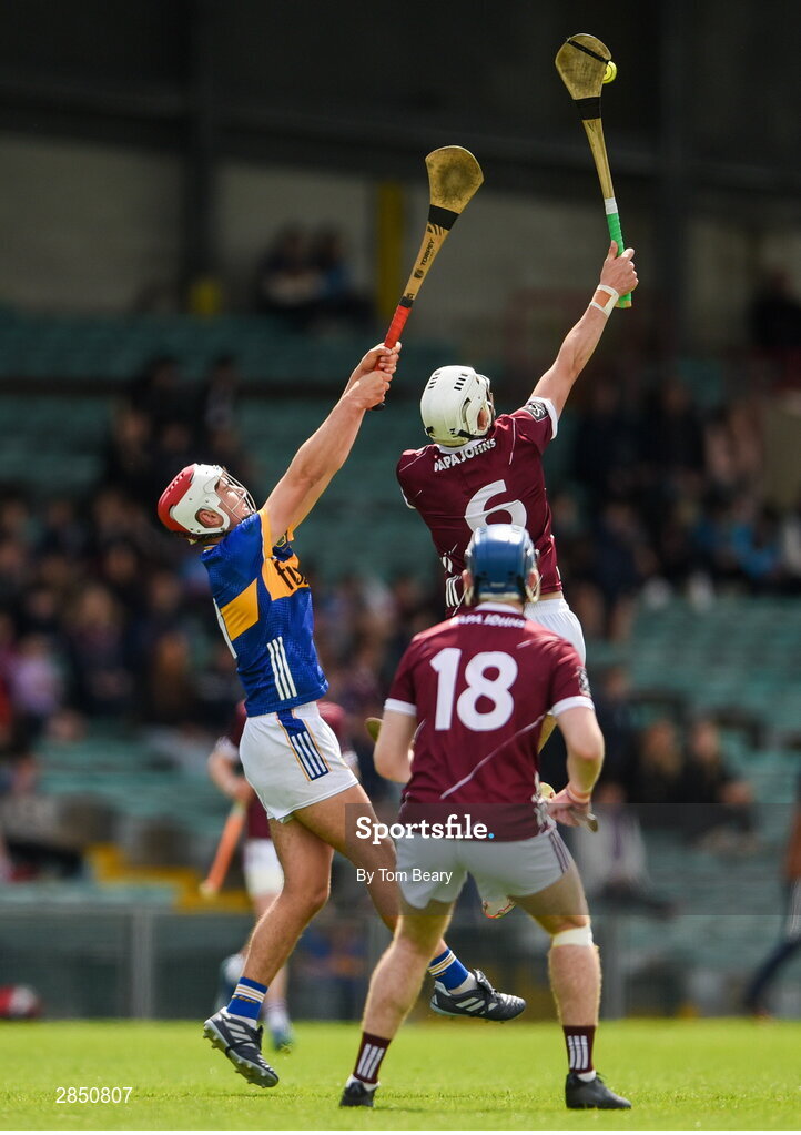 15 June 2024; Jonah Donnellan of Galway in action against Euan Murray of Tipperary during the Electric Ireland GAA Hurling All-Ireland Minor Hurling Championship semi-final match between Tipperary and Galway at TUS Gaelic Grounds in Limerick. Photo by Tom Beary/Sportsfile