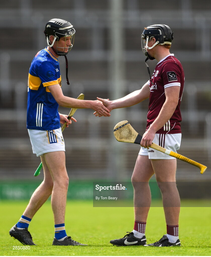 15 June 2024; Owen O'Dwyer of Tipperary shakes hands with Cillian Roche of Galway after the Electric Ireland GAA Hurling All-Ireland Minor Hurling Championship semi-final match between Tipperary and Galway at TUS Gaelic Grounds in Limerick. Photo by Tom Beary/Sportsfile