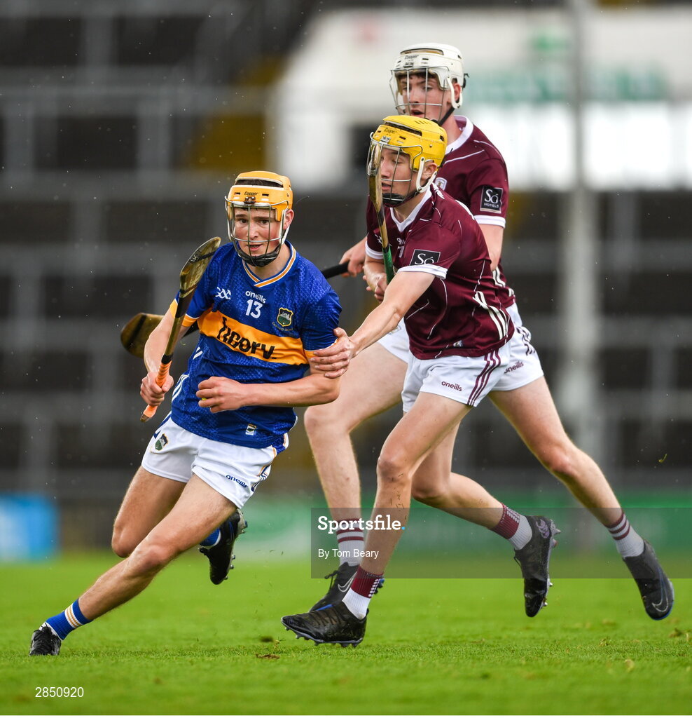 15 June 2024; Eoghan Doughan of Tipperary is tackled by Gavin Maher of Galway during the Electric Ireland GAA Hurling All-Ireland Minor Hurling Championship semi-final match between Tipperary and Galway at TUS Gaelic Grounds in Limerick. Photo by Tom Beary/Sportsfile