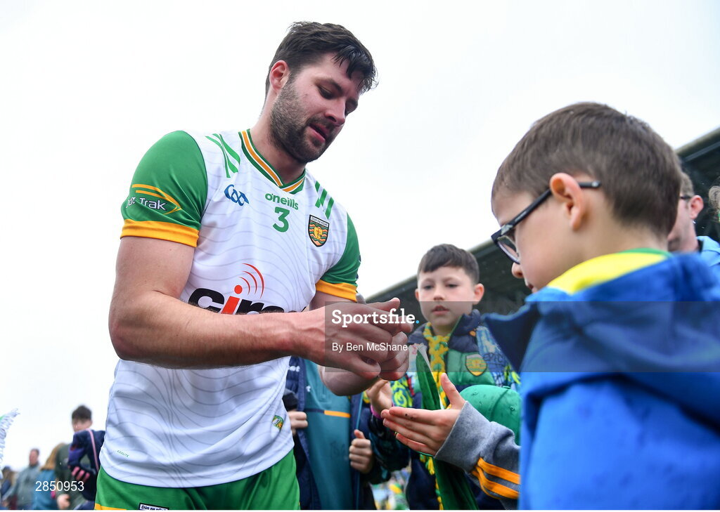 15 June 2024; Brendan McCole of Donegal signs autographs for supporters after the GAA Football All-Ireland Senior Championship Round 3 match between Clare and Donegal at Hastings Insurance MacHale Park in Castlebar, Mayo. Photo by Ben McShane/Sportsfile
