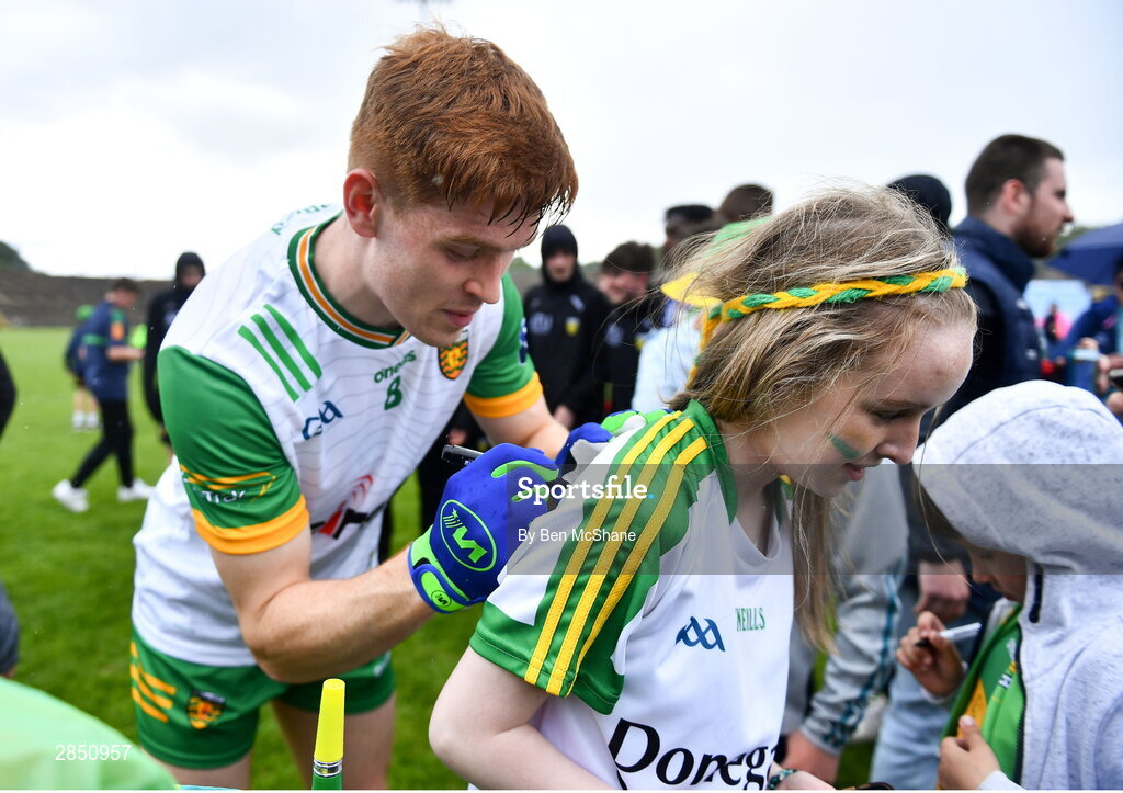 15 June 2024; Ciaran Moore of Donegal signs autographs for supporters after the GAA Football All-Ireland Senior Championship Round 3 match between Clare and Donegal at Hastings Insurance MacHale Park in Castlebar, Mayo. Photo by Ben McShane/Sportsfile