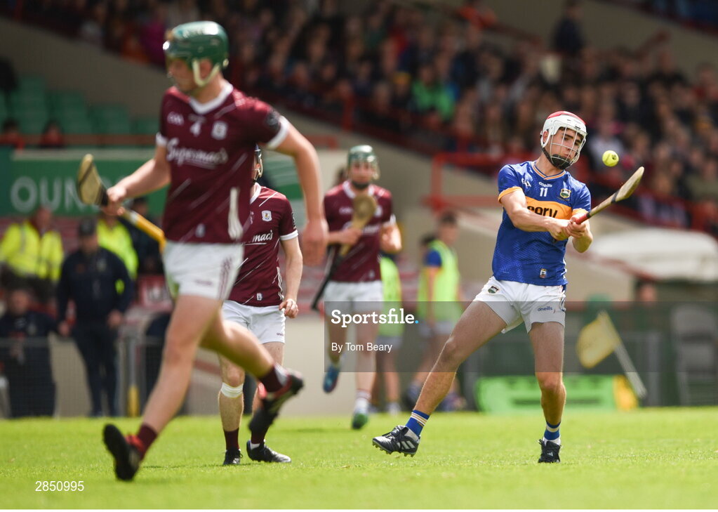 15 June 2024; Euan Murray of Tipperary scores a point during the Electric Ireland GAA Hurling All-Ireland Minor Hurling Championship semi-final match between Tipperary and Galway at TUS Gaelic Grounds in Limerick. Photo by Tom Beary/Sportsfile