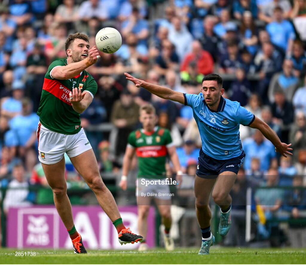 16 June 2024; Aidan O'Shea of Mayo in action against Niall Scully of Dublin during the GAA Football All-Ireland Senior Championship Round 3 match between Dublin and Mayo at Dr Hyde Park in Roscommon. Photo by Daire Brennan/Sportsfile