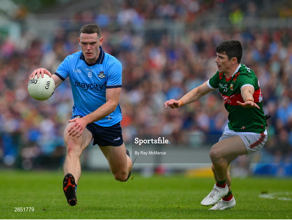 16 June 2024; Brian Fenton of Dublin in action against Conor Loftus of Mayo during the GAA Football All-Ireland Senior Championship Round 3 match between Dublin and Mayo at Dr Hyde Park in Roscommon. Photo by Ray McManus/Sportsfile