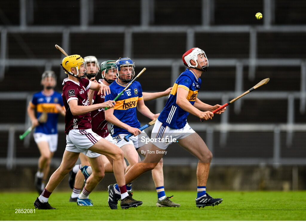 15 June 2024; Euan Murray of Tipperary in action against Gavin Maher of Galway during the Electric Ireland GAA Hurling All-Ireland Minor Hurling Championship semi-final match between Tipperary and Galway at TUS Gaelic Grounds in Limerick. Photo by Tom Beary/Sportsfile