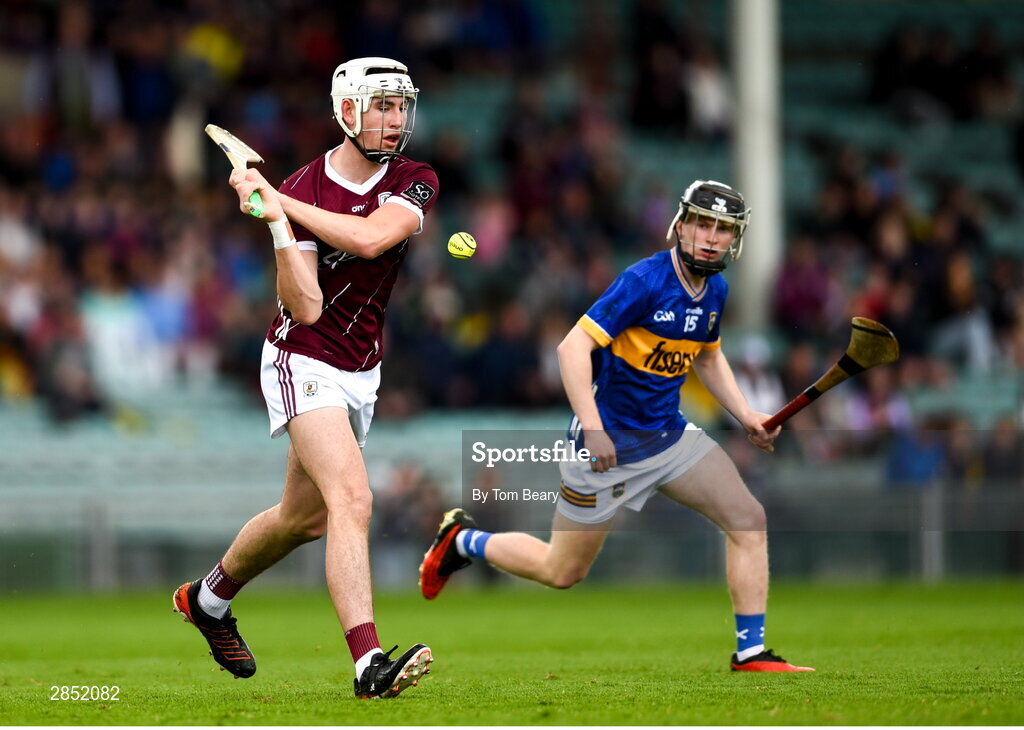 15 June 2024; Jonah Donnellan of Galway in action against Cillian Minogue of Tipperary during the Electric Ireland GAA Hurling All-Ireland Minor Hurling Championship semi-final match between Tipperary and Galway at TUS Gaelic Grounds in Limerick. Photo by Tom Beary/Sportsfile