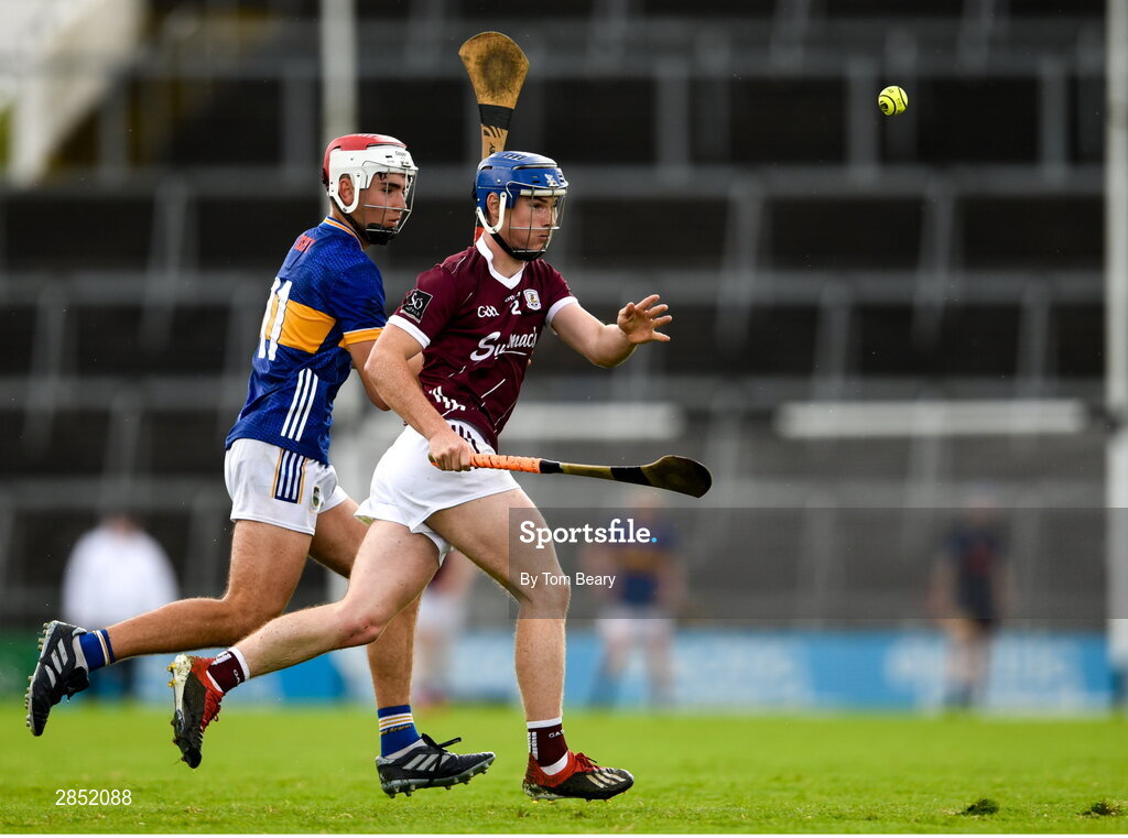 15 June 2024; Cathal Maloney of Galway in action against Euan Murray of Tipperary during the Electric Ireland GAA Hurling All-Ireland Minor Hurling Championship semi-final match between Tipperary and Galway at TUS Gaelic Grounds in Limerick. Photo by Tom Beary/Sportsfile