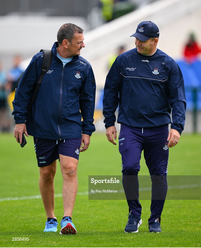 16 June 2024; Séamus McCormack, left, and Dublin manager Dessie Farrell the GAA Football All-Ireland Senior Championship Round 3 match between Dublin and Mayo at Dr Hyde Park in Roscommon. Photo by Ray McManus/Sportsfile