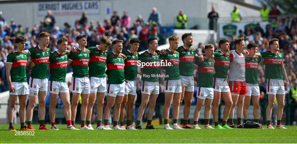 16 June 2024; The Mayo 'starting 15' stand for the playing of the National Anthem before the GAA Football All-Ireland Senior Championship Round 3 match between Dublin and Mayo at Dr Hyde Park in Roscommon. Photo by Ray McManus/Sportsfile