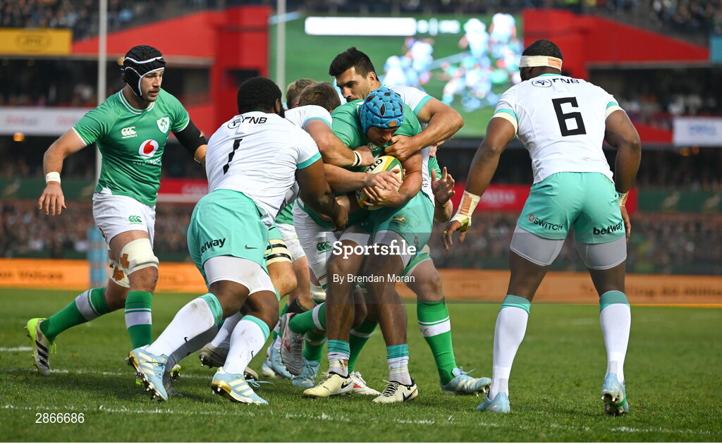 6 July 2024; Tadhg Beirne of Ireland is tackled by Ox Nche, Frans Malherbe and Damian de Allende of South Africa during the first test between South Africa and Ireland at Loftus Versfeld Stadium in Pretoria, South Africa. Photo by Brendan Moran/Sportsfile
