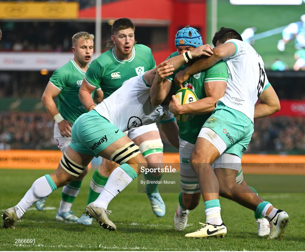6 July 2024; Tadhg Beirne of Ireland is tackled by Ox Nche, Frans Malherbe and Damian de Allende of South Africa during the first test between South Africa and Ireland at Loftus Versfeld Stadium in Pretoria, South Africa. Photo by Brendan Moran/Sportsfile