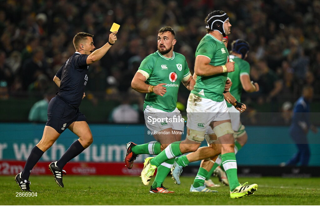 6 July 2024; Rónan Kelleher of Ireland, centre, is shown a yellow card by referee Luke Pearce during the first test between South Africa and Ireland at Loftus Versfeld Stadium in Pretoria, South Africa. Photo by Brendan Moran/Sportsfile