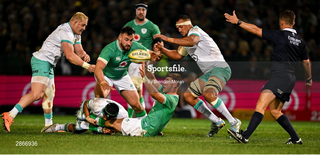 6 July 2024; Jack Crowley of Ireland attempts to offload as he is tackled by Kurt-Lee Arendse of South Africa during the first test between South Africa and Ireland at Loftus Versfeld Stadium in Pretoria, South Africa. Photo by Brendan Moran/Sportsfile