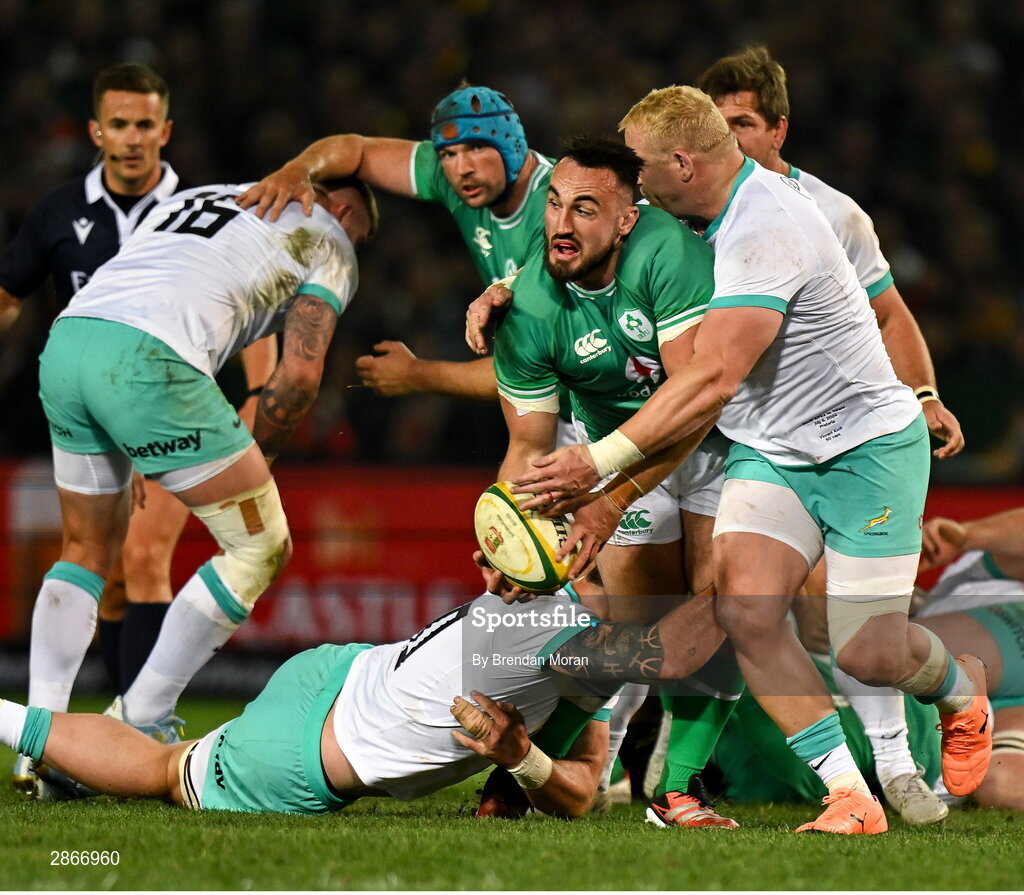 6 July 2024; Rónan Kelleher of Ireland is tackled by RG Snyman and Vincent Koch of South Africa during the first test between South Africa and Ireland at Loftus Versfeld Stadium in Pretoria, South Africa. Photo by Brendan Moran/Sportsfile