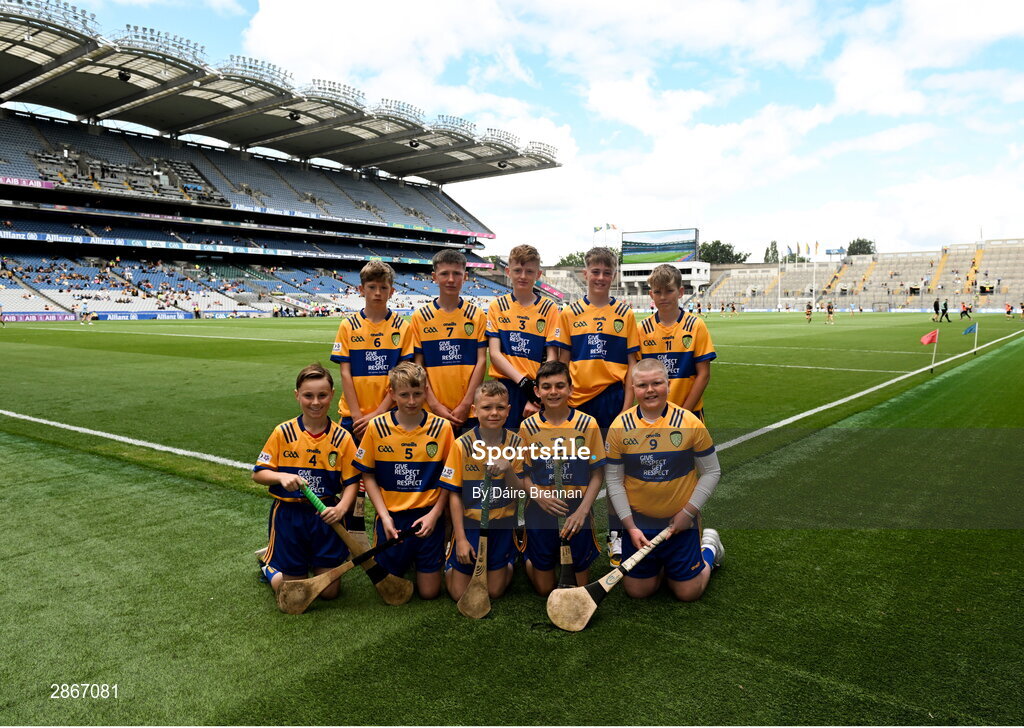 6 July 2024; The Clare team, back row, left to right, DJ Leonard, Dromin NS, Dunleer, Louth, Gavin Devery, St Rynagh's NS, Banagher, Offaly, John Bloomer, St Brendan's NS, Portumna, Galway, Fionn Guinnessy, St Brendan's Boys NS, Loughrea, Galway, Mark Dennedy, Kinnitty NS, Kinnitty, Offaly, front row, left to right, Lúc Ó Madagáin, Gaelscoil na Cruaiche, Mhaigh Eo, Cillian Casey, Toreen NS, Mayo, Daithí McManus, CBS Primary, Keady Road, Armagh, Daniel Maher, Clonlisk NS, Shinrone, Offaly, Danny Kerry, Holy Family Senior School, Portlaoise, Laois, ahead of the GAA INTO Cumann na mBunscol Respect Exhibition Go Games at the GAA Hurling All-Ireland Senior Championship semi-final match between Kilkenny and Clare at Croke Park in Dublin. Photo by Daire Brennan/Sportsfile