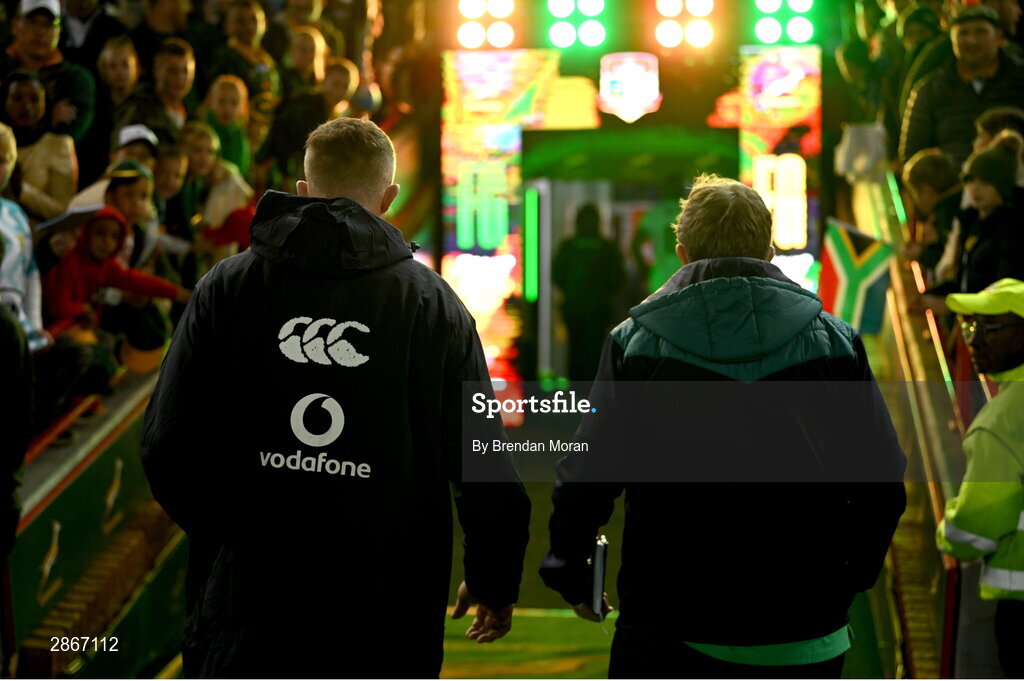6 July 2024; Ireland captain Peter O'Mahony leaves the pitch with Ireland communications manager Peter Breen after the first test between South Africa and Ireland at Loftus Versfeld Stadium in Pretoria, South Africa. Photo by Brendan Moran/Sportsfile