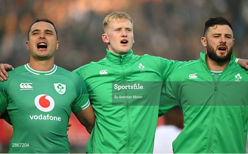 6 July 2024; Ireland players, from left, James Lowe, Jamie Osborne and Robbie Henshaw during the national anthems before the first test between South Africa and Ireland at Loftus Versfeld Stadium in Pretoria, South Africa. Photo by Brendan Moran/Sportsfile