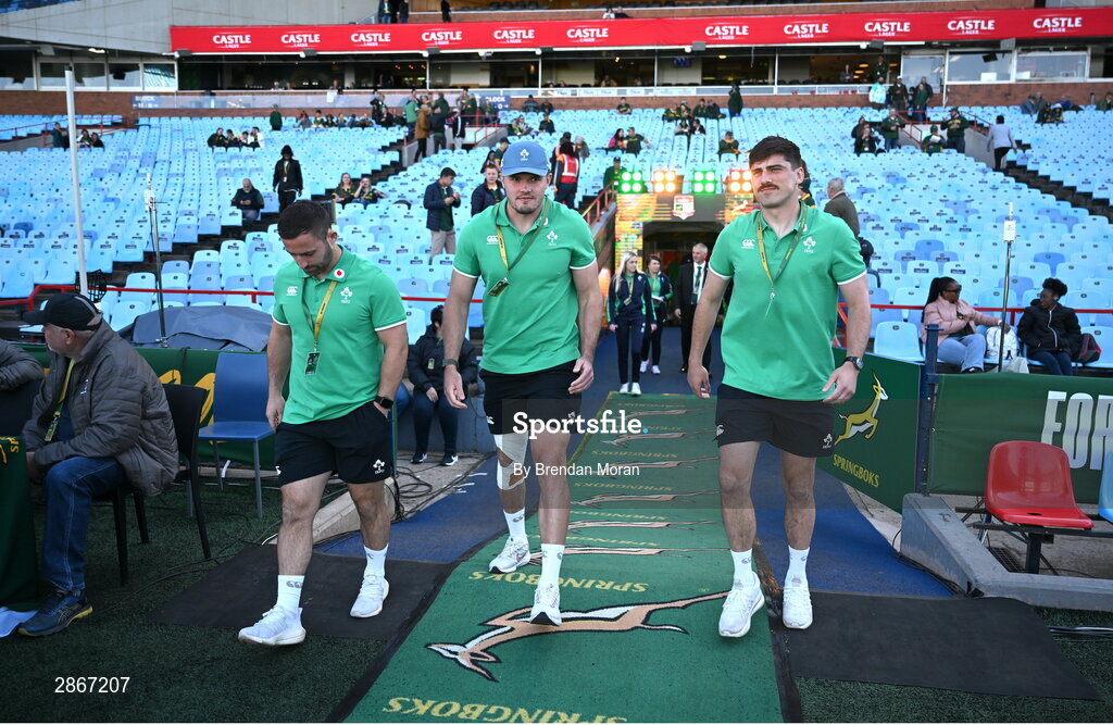 6 July 2024; Ireland players, from left, Caolin Blade, Jacob Stockdale and Jimmy O’Brien arrive before the first test between South Africa and Ireland at Loftus Versfeld Stadium in Pretoria, South Africa. Photo by Brendan Moran/Sportsfile