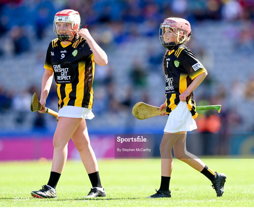 6 July 2024; Faye O'Connell, Rathnure NS, Rathnure, Wexford, representing Kilkenny, right, and Laura Tansey, Scoil Mhuire, An Muileann gCearr, An Iarmhí, representing Kilkenny, during the GAA INTO Cumann na mBunscol Respect Exhibition Go Games at the GAA Hurling All-Ireland Senior Championship semi-final match between Kilkenny and Clare at Croke Park in Dublin. Photo by Stephen McCarthy/Sportsfile