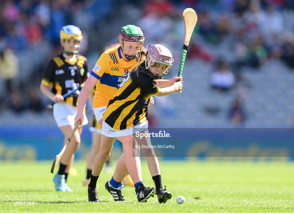 6 July 2024; Faye O'Connell, Rathnure NS, Rathnure, Wexford, representing Kilkenny, and Méabh Gallagher, Kiltale NS, Dunsany, Meath, representing Clare, during the GAA INTO Cumann na mBunscol Respect Exhibition Go Games at the GAA Hurling All-Ireland Senior Championship semi-final match between Kilkenny and Clare at Croke Park in Dublin. Photo by Stephen McCarthy/Sportsfile