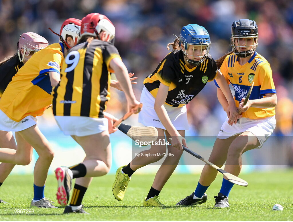 6 July 2024; Eva Hamilton, Bunscoil Bóthar na Naomh, Port Láirge, representing Kilkenny, and Kayla Reynolds, St Manachan's NS, Mohill, Leitrim, representing Clare, during the GAA INTO Cumann na mBunscol Respect Exhibition Go Games at the GAA Hurling All-Ireland Senior Championship semi-final match between Kilkenny and Clare at Croke Park in Dublin. Photo by Stephen McCarthy/Sportsfile