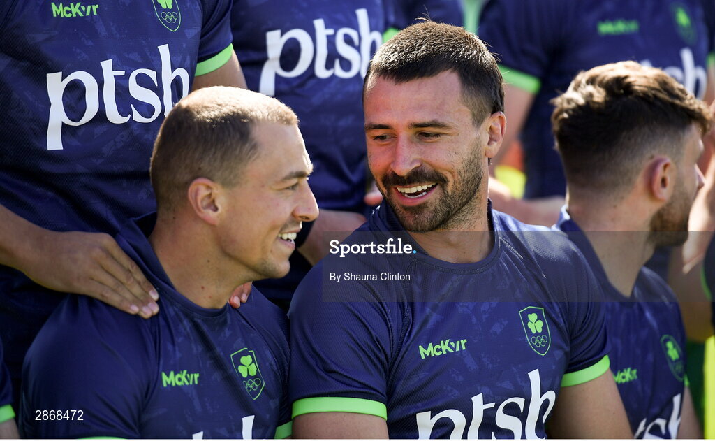 8 July 2024; Harry McNulty, centre, converses with team-mate Hugo Lennox, left, during the Team Ireland Paris 2024 team training for Rugby Sevens ahead of the Paris 2024 Olympic Games at the IRFU Outdoor Pitch on the Sport Ireland Campus in Dublin. Photo by Shauna Clinton/Sportsfile