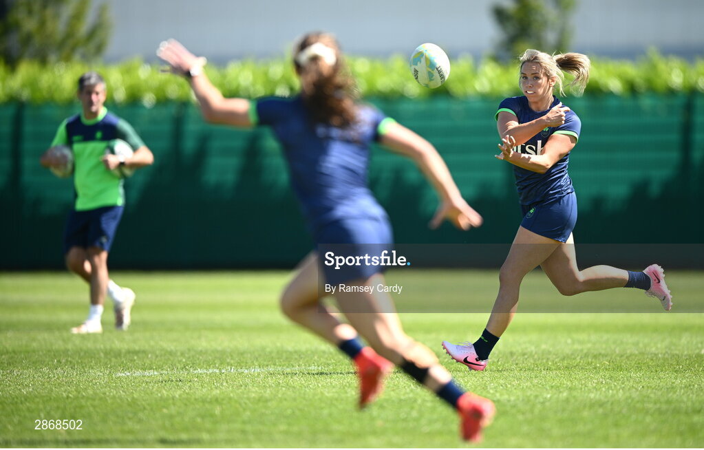 8 July 2024; Stacey Flood passes the ball to team-mate Lucy Rock during the Team Ireland Paris 2024 team training for Rugby Sevens ahead of the Paris 2024 Olympic Games at the IRFU Outdoor Pitch on the Sport Ireland Campus in Dublin. Photo by Ramsey Cardy/Sportsfile