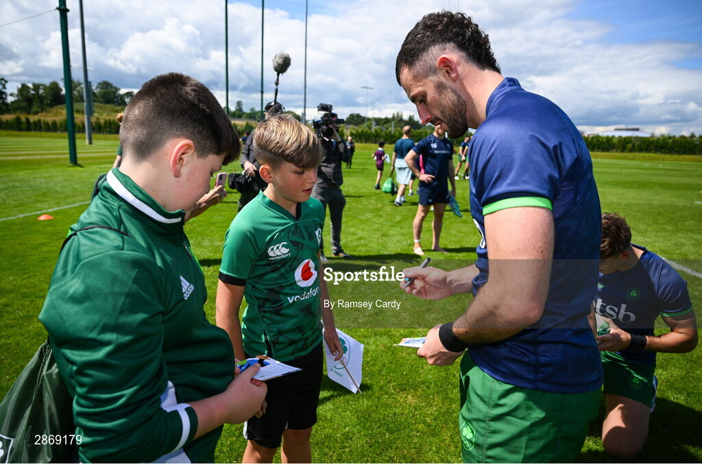 8 July 2024; Andrew Smith signs autographs after the Team Ireland Paris 2024 team training for Rugby Sevens ahead of the Paris 2024 Olympic Games at the IRFU Outdoor Pitch on the Sport Ireland Campus in Dublin. Photo by Ramsey Cardy/Sportsfile