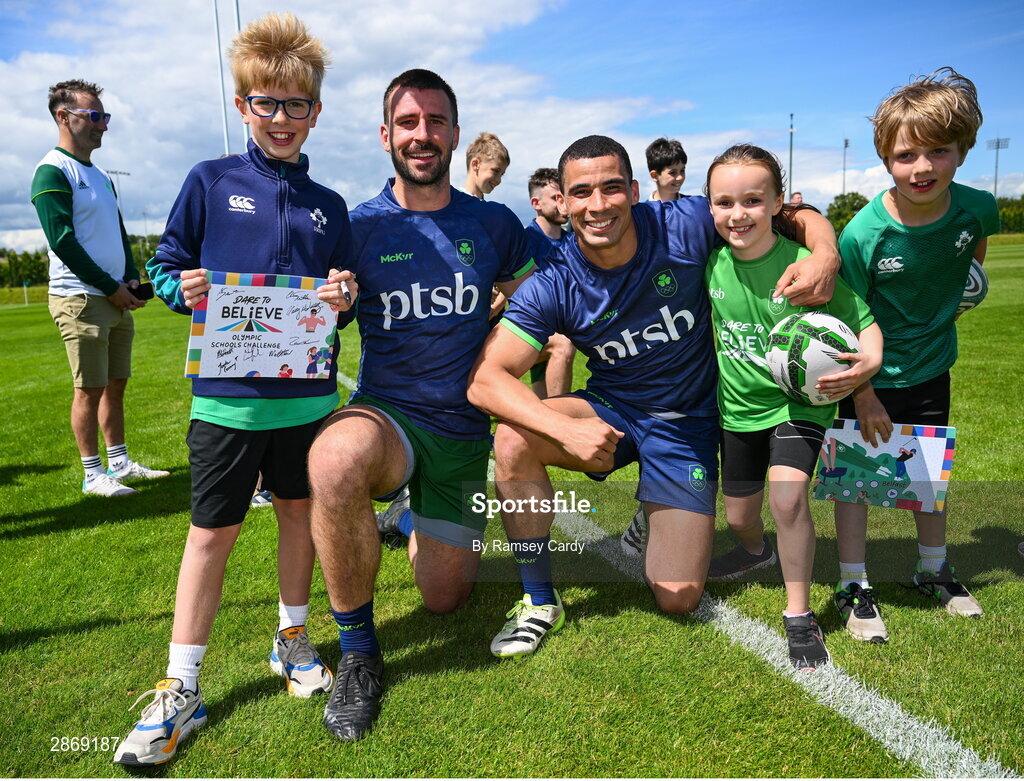 8 July 2024; Harry McNulty and Jordan Conroy with supporters during the Team Ireland Paris 2024 team training for Rugby Sevens ahead of the Paris 2024 Olympic Games at the IRFU Outdoor Pitch on the Sport Ireland Campus in Dublin. Photo by Ramsey Cardy/Sportsfile