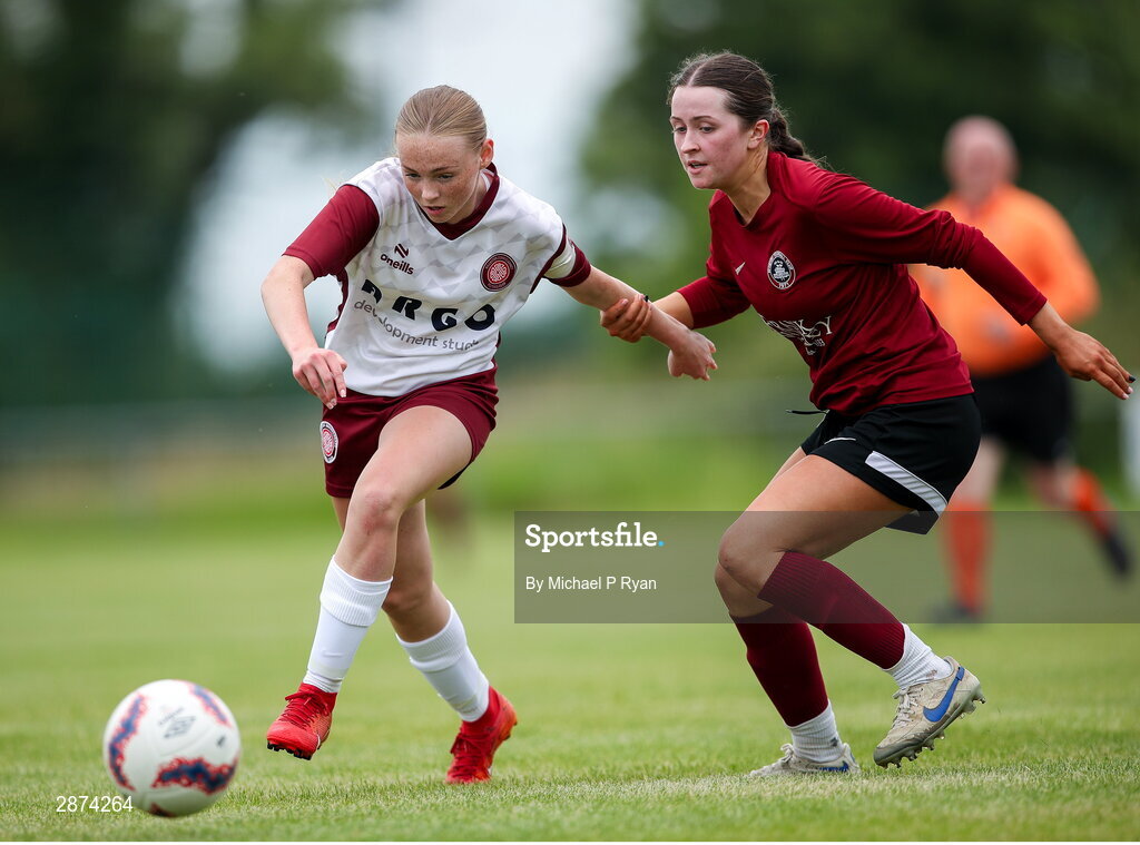 14 July 2024; Drew Hendrick of Killester Donnycarney FC in action against Kerri O'Driscoll of Athenry during the FAI Women's Under 17 Cup final match between Athenry and Killester Donnycarney FC at Mullingar Athletic FC in Gainstown, Westmeath. Photo by Michael P Ryan/Sportsfile