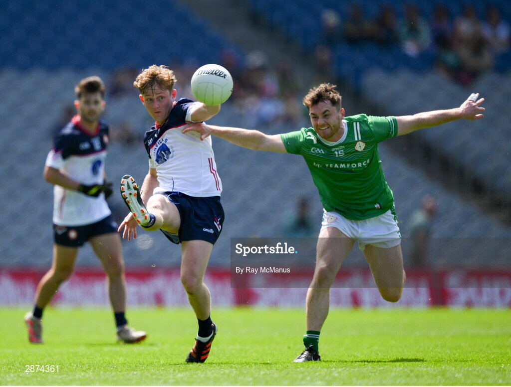 14 July 2024; Thomas Shalvey of New York is tackled by Aidan McGarvey of London  during the GAA Football All-Ireland Junior Championship final between London and New York at Croke Park in Dublin. Photo by Ray McManus/Sportsfile