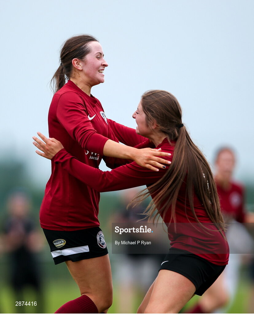 14 July 2024; Kerri O'Driscoll of Athenry, left, celebrates after scoring her side's first goal with teammate Mollie Noone during the FAI Women's Under 17 Cup final match between Athenry and Killester Donnycarney FC at Mullingar Athletic FC in Gainstown, Westmeath. Photo by Michael P Ryan/Sportsfile