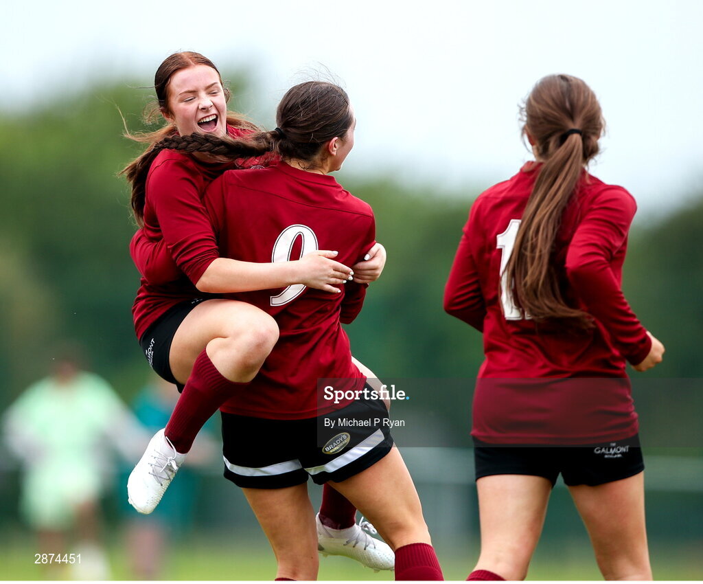 14 July 2024; Kerri O'Driscoll of Athenry, 9, is congratulated by teamamte Ella Farrelly, left, after scorig her side's first goal during the FAI Women's Under 17 Cup final match between Athenry and Killester Donnycarney FC at Mullingar Athletic FC in Gainstown, Westmeath. Photo by Michael P Ryan/Sportsfile