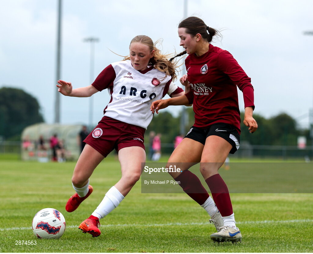 14 July 2024; Drew Hendrick of Killester Donnycarney FC in action against Kerri O'Driscoll of Athenry during the FAI Women's Under 17 Cup final match between Athenry and Killester Donnycarney FC at Mullingar Athletic FC in Gainstown, Westmeath. Photo by Michael P Ryan/Sportsfile