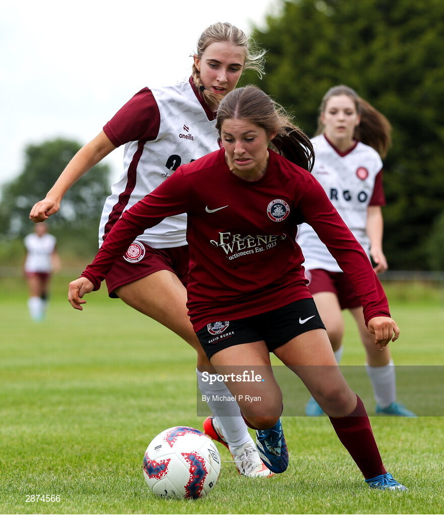 14 July 2024; Mollie Noone of Athenry in action against Sienna Heary of Killester Donnycarney FC during the FAI Women's Under 17 Cup final match between Athenry and Killester Donnycarney FC at Mullingar Athletic FC in Gainstown, Westmeath. Photo by Michael P Ryan/Sportsfile