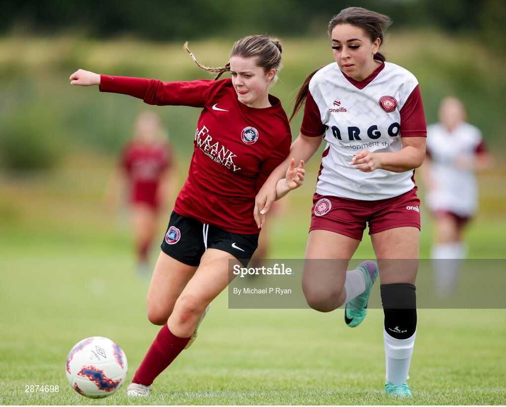 14 July 2024; Chloe McHugh of Athenry in action against Emmy Jo Caffery of Killester Donnycarney FC during the FAI Women's Under 17 Cup final match between Athenry and Killester Donnycarney FC at Mullingar Athletic FC in Gainstown, Westmeath. Photo by Michael P Ryan/Sportsfile