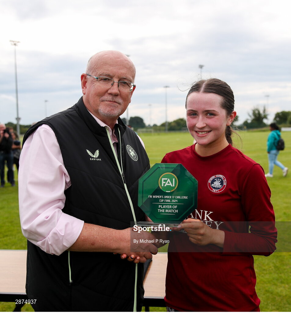 14 July 2024; Kerri O'Driscoll of Athenry receives the Player of the Match award from FAI Director of Competitions Fran Gavin after the FAI Women's Under 17 Cup final match between Athenry and Killester Donnycarney FC at Mullingar Athletic FC in Gainstown, Westmeath. Photo by Michael P Ryan/Sportsfile