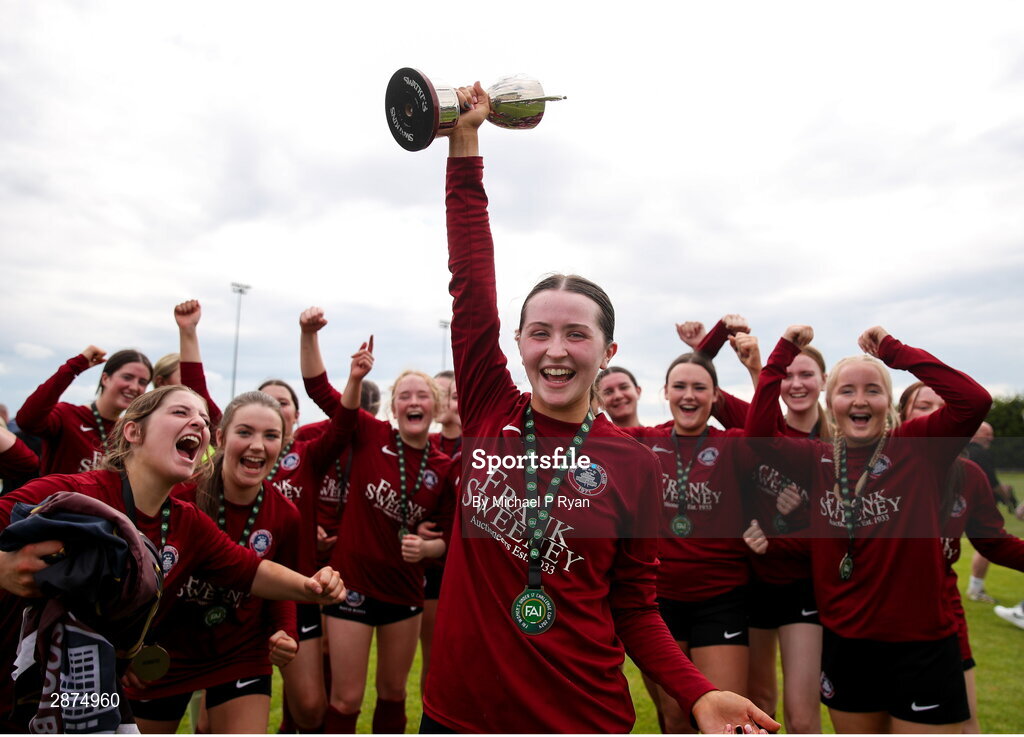 14 July 2024; Athenry captain Kerri O'Driscoll lifts the cup afyter the FAI Women's Under 17 Cup final match between Athenry and Killester Donnycarney FC at Mullingar Athletic FC in Gainstown, Westmeath. Photo by Michael P Ryan/Sportsfile