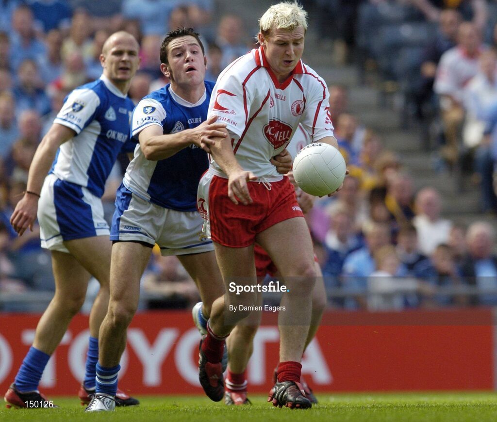 1 August 2004; Eoin Mulligan, Tyrone, in action against Cathal Ryan, Laois. Bank of Ireland All-Ireland Football Championship, Round 4, Laois v Tyrone, Croke Park, Dublin. Picture credit; Damien Eagers / SPORTSFILE
