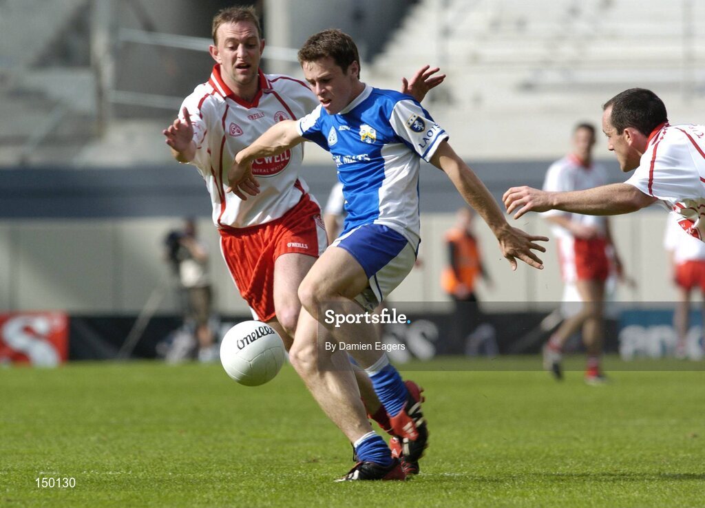 1 August 2004; Padraig McMahon, Laois, in action against Gerard Cavlan, left, and Brian Dooher, Tyrone. Bank of Ireland All-Ireland Football Championship, Round 4, Laois v Tyrone, Croke Park, Dublin. Picture credit; Damien Eagers / SPORTSFILE